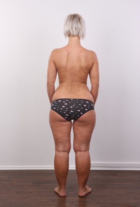 Overweight amateur Lenka shows off her big areola and ass as he undresses