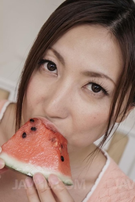 Japanese MILF Mirei Yokoyama eats watermelon before licking a cock