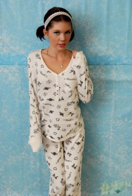 Cute young Diddylicious in pigtails posing non nude in her girly pajamas