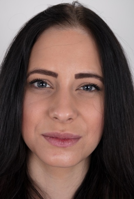 Dark haired female with a firm face model in the nude for the first time