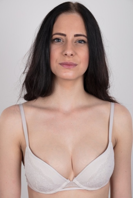 Dark haired female with a firm face model in the nude for the first time