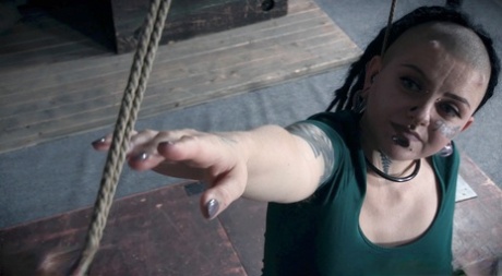 Alt model Luna Lavey is restrained before undergoing forced masturbation