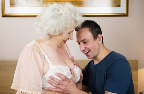 Lusty grandma takes a cumshot after having sexual relations with young lover