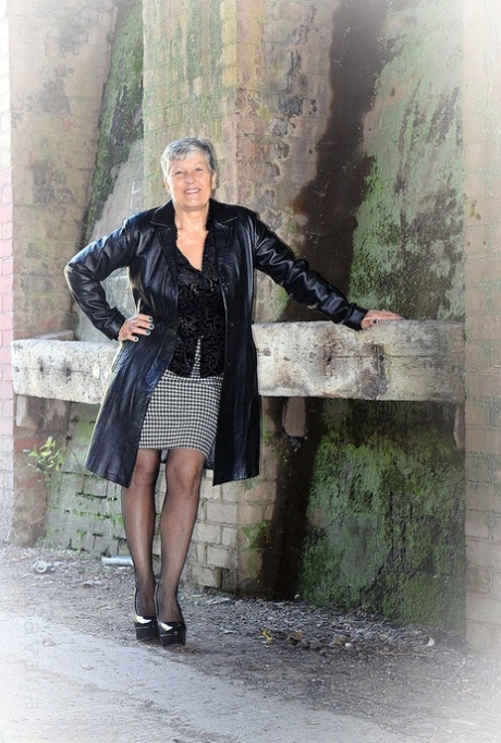Brazen hot mature granny Savana poses outdoors in her sexy lingerie