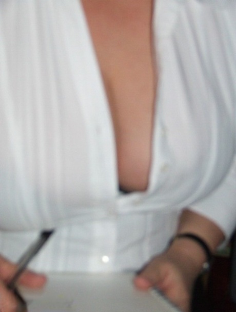 Granny Kinky Carol reveals her huge tits and phat ass in black lingerie