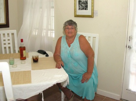 Obese amateur Grandma Libby bares her tan lined body after a phone sex