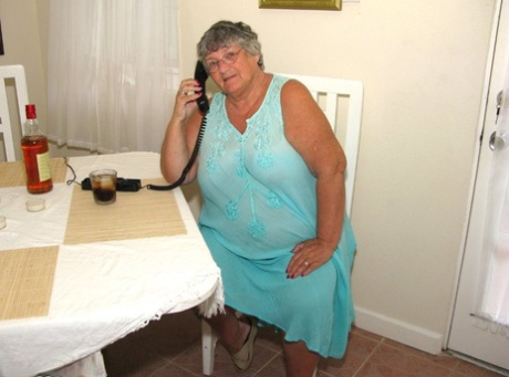 Obese amateur Grandma Libby bares her tan lined body after a phone sex