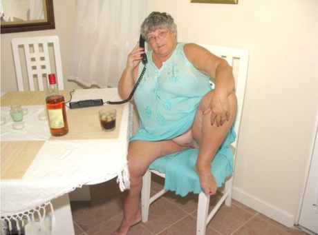 Obese amateur Grandma Libby bares her tan lined body after a phone sex