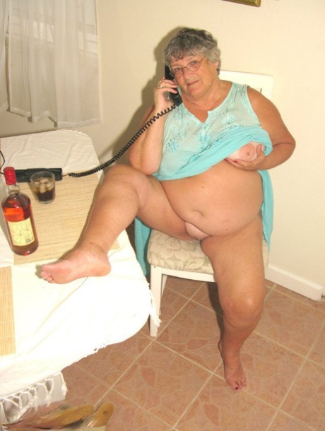 Obese amateur Grandma Libby bares her tan lined body after a phone sex