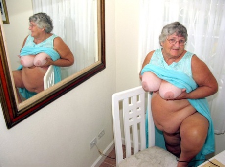 Obese amateur Grandma Libby bares her tan lined body after a phone sex