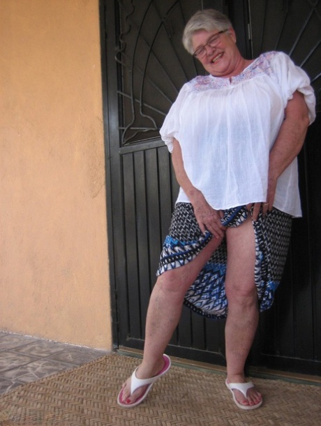 Old amateur Girdle Goddess exposes her obese body outside her front door
