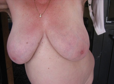 Old amateur Girdle Goddess exposes her obese body outside her front door