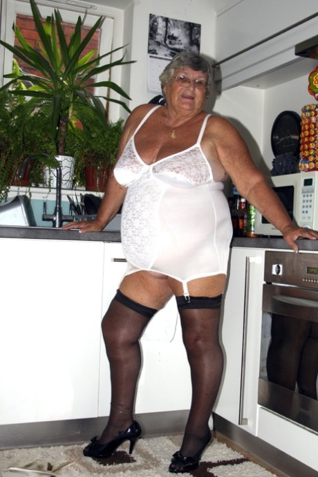Obese nan Grandma Libby releases her tits and snatch from vintage lingerie