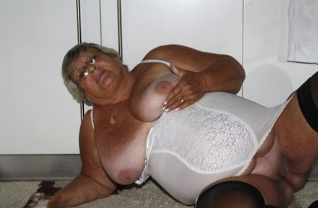 Obese nan Grandma Libby releases her tits and snatch from vintage lingerie