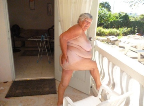 Fat oma Grandma Libby gets completely naked on a balcony by herself