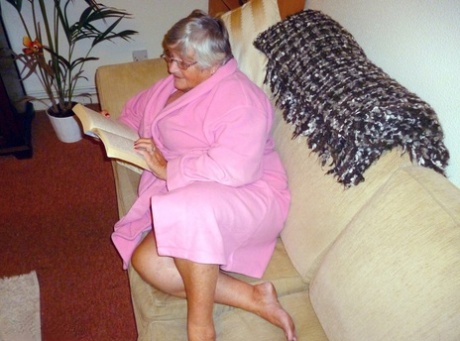 Obese UK nan Grandma Libby masturbates while reading a romance novel