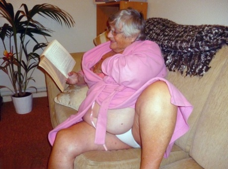 Obese UK nan Grandma Libby masturbates while reading a romance novel
