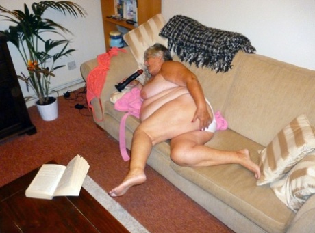 Obese UK nan Grandma Libby masturbates while reading a romance novel