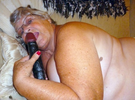 Obese UK nan Grandma Libby masturbates while reading a romance novel