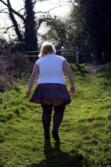 Overweight blonde Lexie Cummings exposes herself by locks on a canal system