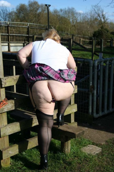 Overweight blonde Lexie Cummings exposes herself by locks on a canal system