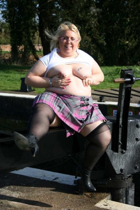 Overweight blonde Lexie Cummings exposes herself by locks on a canal system