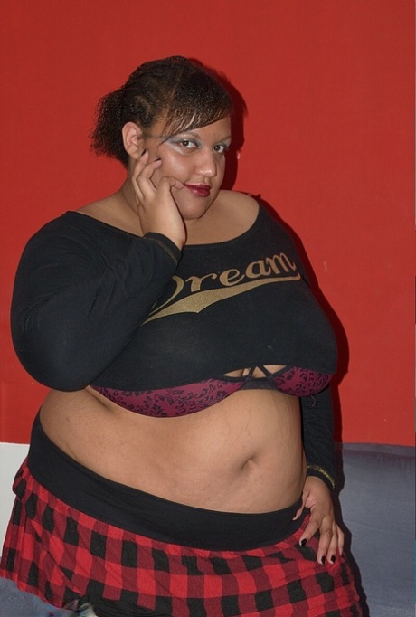 SSBBBW Curvybunnyb reaches around her fat belly to pet her vagina