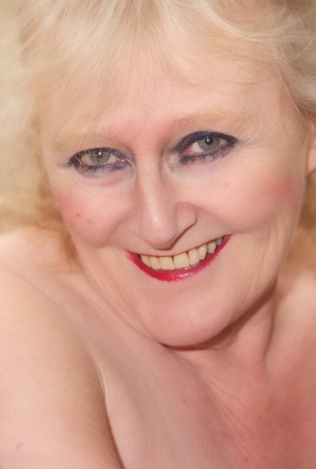 Lovely granny Claire Knight showing her perfect mature body in pantyhose