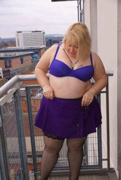 Older British BBW Lexie Cummings exposes her fat ass and twat on a balcony