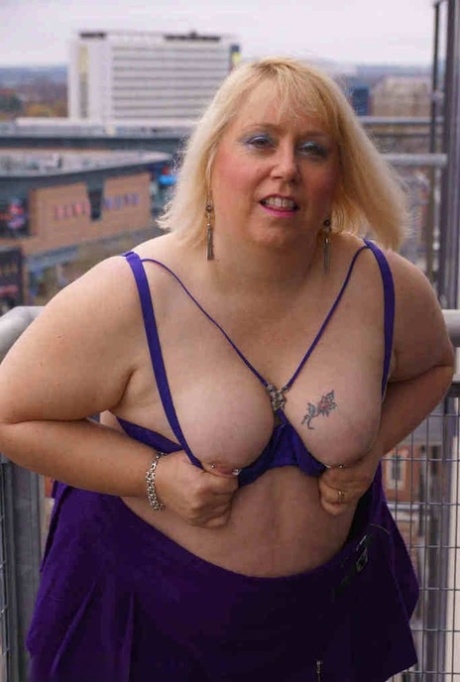 Older British BBW Lexie Cummings exposes her fat ass and twat on a balcony