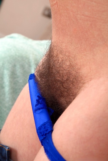 Older amateur Alexis May exposes her big naturals before showing her full bush