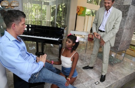 Slender black girl wears a choker while having sex with 2 white men at once