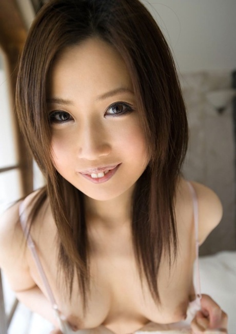 Cute Japanese girl Haruka Yagami models nude and non nude during solo action