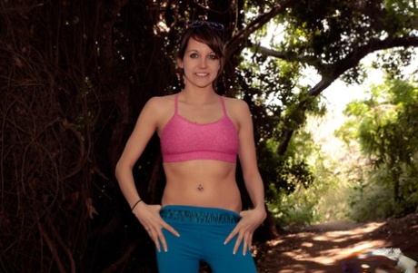 Young girl Andi Land exposes herself during a hiking expedition