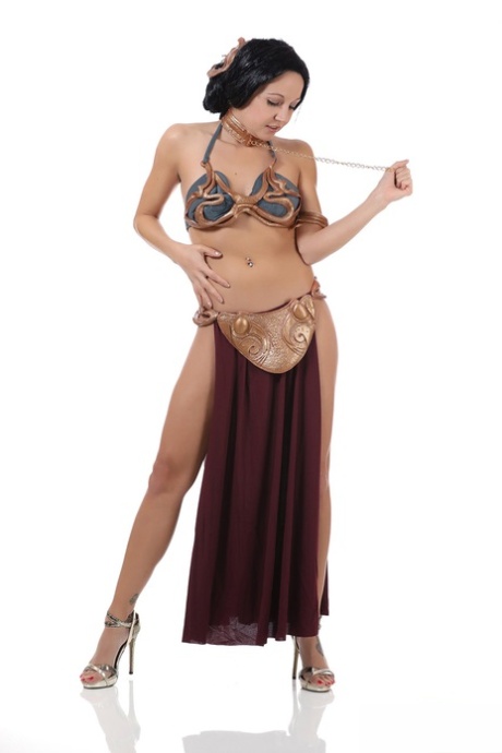 Amateur model Andi Land works her hard body free of cosplay clothing