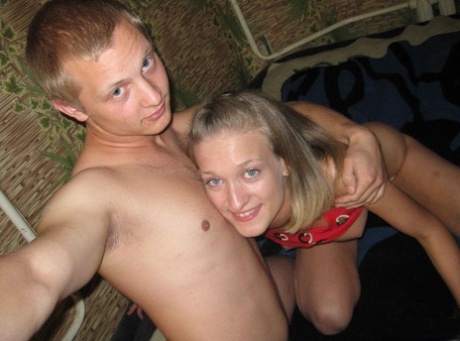 Young looking blonde and her boyfriend take selfies while fucking