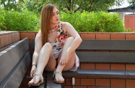 Natural redhead Sutton dildos her pussy after flashing upskirt panties outside