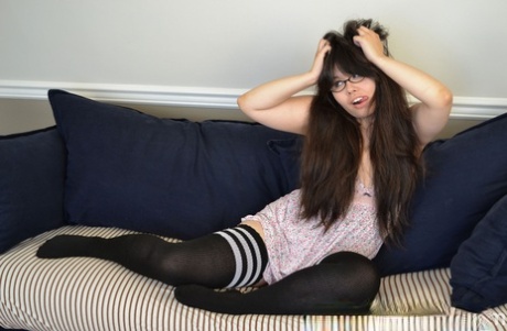 Geeky amateur Hermine Haller pleasures her vagina in glasses and thigh highs