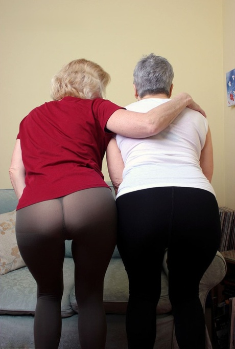 Old lesbians suck on each others boobs after modeling fully clothed
