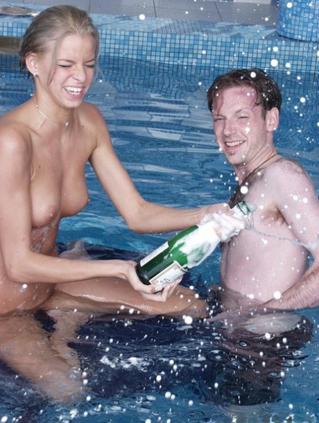 Naked girl finger spreads her bald twat while skinny dipping with man friends
