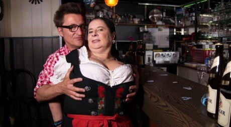 Obese German granny serves up a beer before sucking and fucking a customer