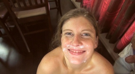 Amateur girl proudly wears cum on her face after a blowbang at home