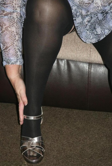 Old fatty Valgasmic Exposed exposes her huge ass in black stockings and heels