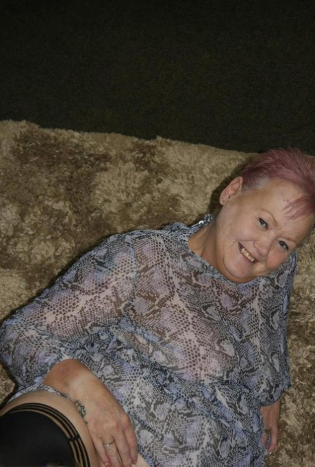 Fat nan Valgasmic Exposed casts off her dress to go naked in black stockings
