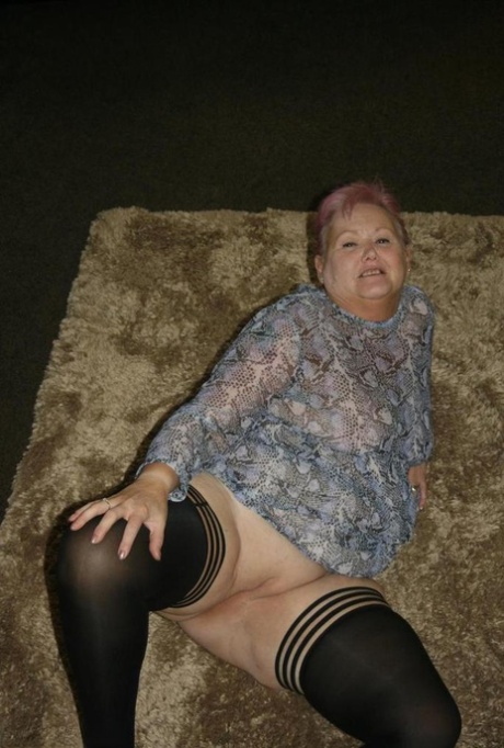 Fat nan Valgasmic Exposed casts off her dress to go naked in black stockings