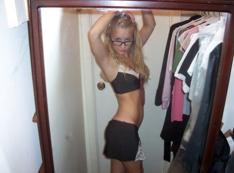 Blonde teen Kylie takes s topless SFW selfies in front of a mirror