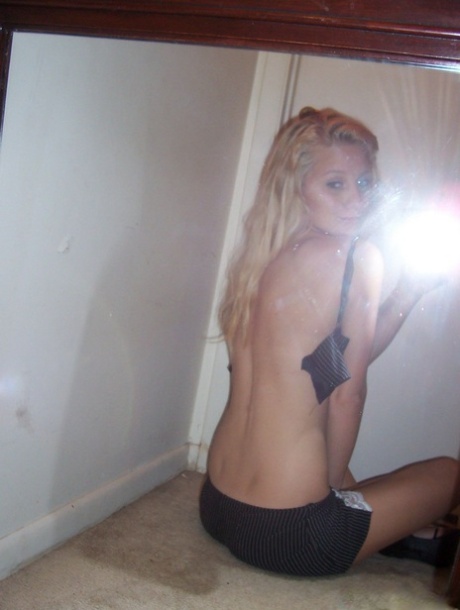 Blonde teen Kylie takes s topless SFW selfies in front of a mirror