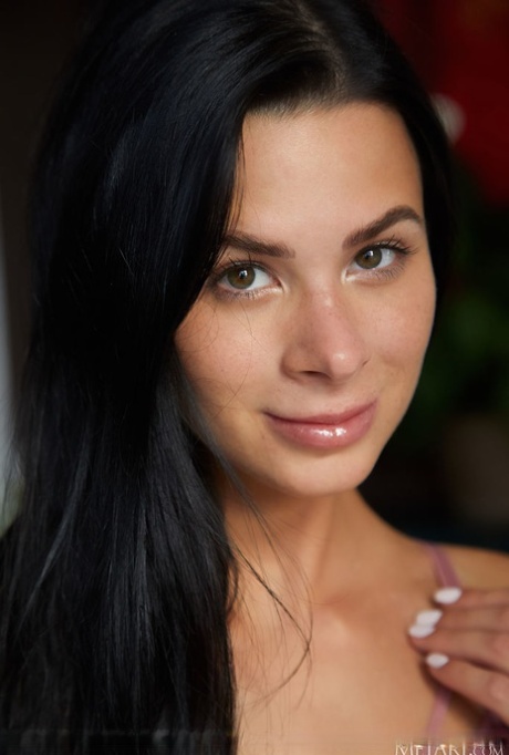 Dark haired teen Jenny Doll doffs satin lingerie before confident nude poses