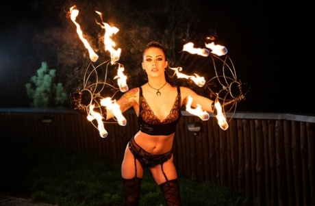 Fire performer Anna Deville partakes in interracial anal sex in latex gloves