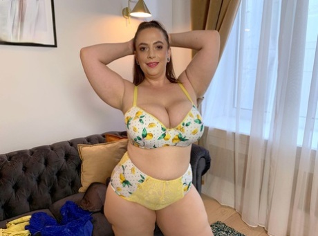 BBW Mia Sweetheart models lingerie before applying lotion to her huge tits